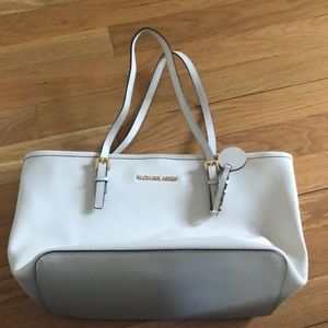 Michael Kors cream over the shoulder bag